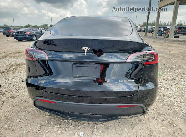 7SAYGDEE5SA337858 2025 TESLA MODEL Black უკანა ხედი