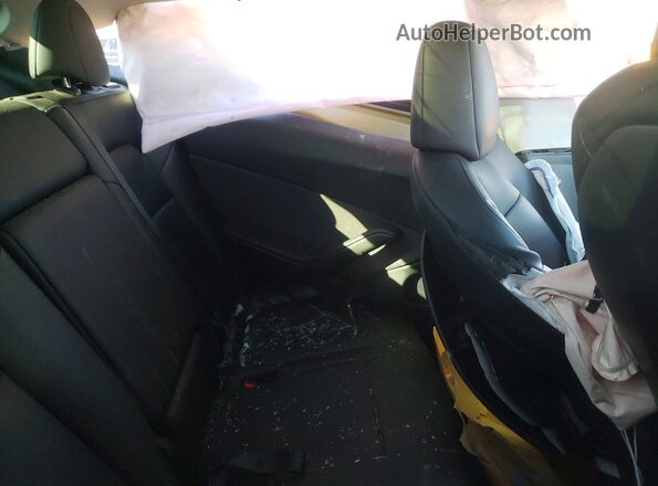 7SAYGDEE6RA236743 2024 TESLA MODEL Charcoal Vista de los asientos traseros