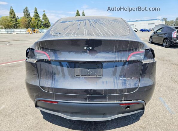 7SAYGDEE6RF006784 2024 TESLA MODEL Charcoal Հետևի տեսք