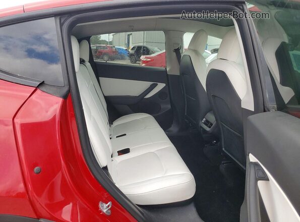 7SAYGDEE7NF354099 2022 TESLA MODEL Red Вид задньої частини салону
