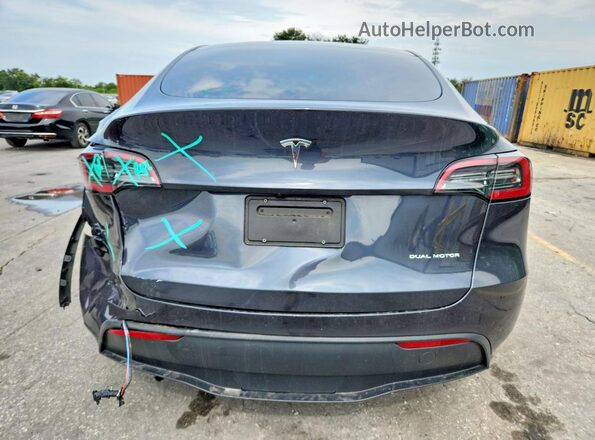 7SAYGDEE7SA346237 2025 TESLA MODEL Gray უკანა ხედი
