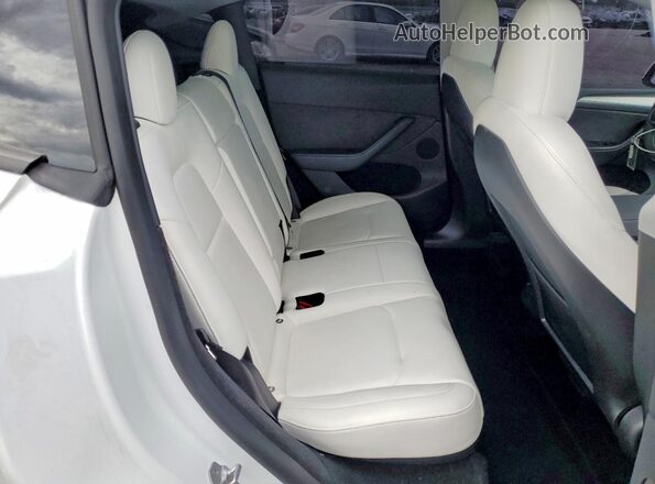 7SAYGDEE8PA100675 2023 TESLA MODEL White Vista de los asientos traseros