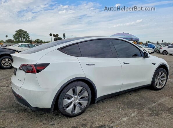 7SAYGDEE8PA100675 2023 TESLA MODEL White Trasero derecho