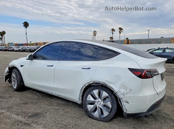 7SAYGDEE8PA100675 2023 TESLA MODEL White Trasero izquierdo