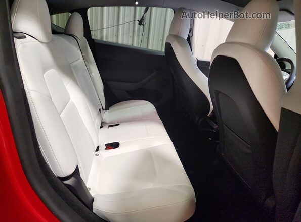 7SAYGDEE8PA144465 2023 TESLA MODEL Red უკანა სავარძლების ხედი