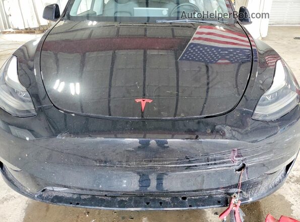 7SAYGDEE8PF755762 2023 TESLA MODEL Black Սալոնի հետևի տեսք