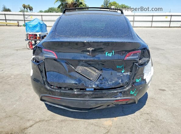 7SAYGDEE8PF816799 2023 TESLA MODEL Black Հետևի տեսք