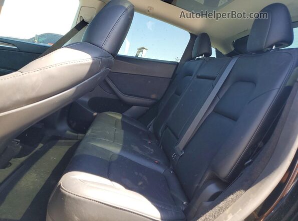 7SAYGDEE8PF816799 2023 TESLA MODEL Black Հետևի նստատեղերի տեսք