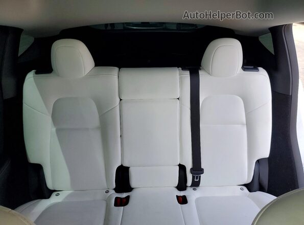 7SAYGDEE8PF909564 2023 TESLA MODEL White Rear seats view