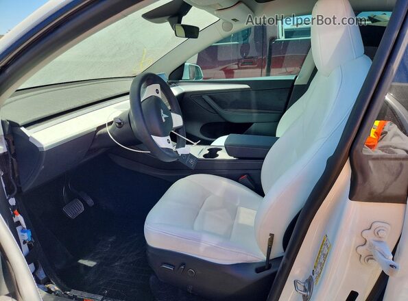 7SAYGDEE8PF909564 2023 TESLA MODEL White Front interior view