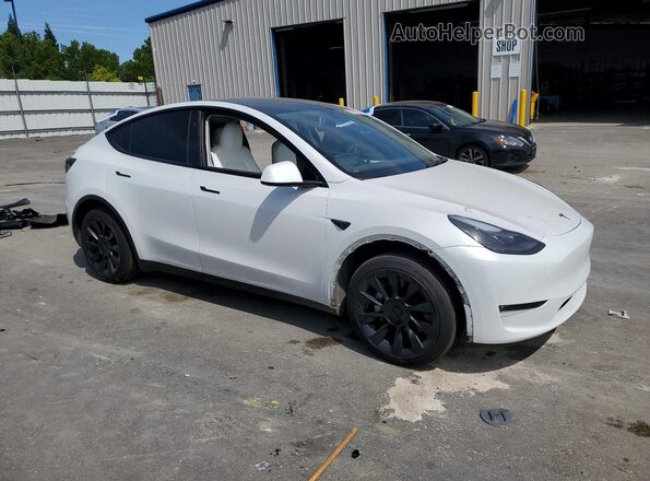 7SAYGDEE8PF909564 2023 TESLA MODEL White Front right