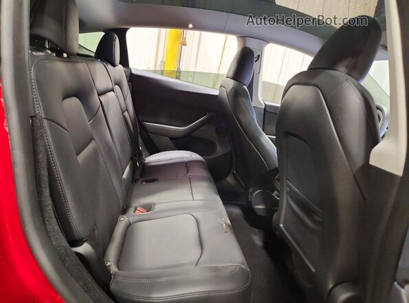 7SAYGDEE8RA234072 2024 TESLA MODEL Red Vista de los asientos traseros