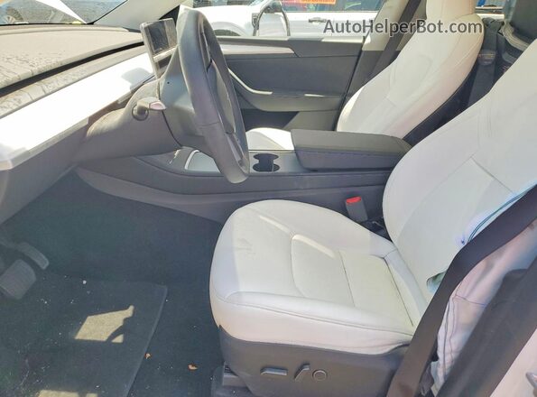 7SAYGDEE9PA211641 2023 TESLA MODEL White Front interior view