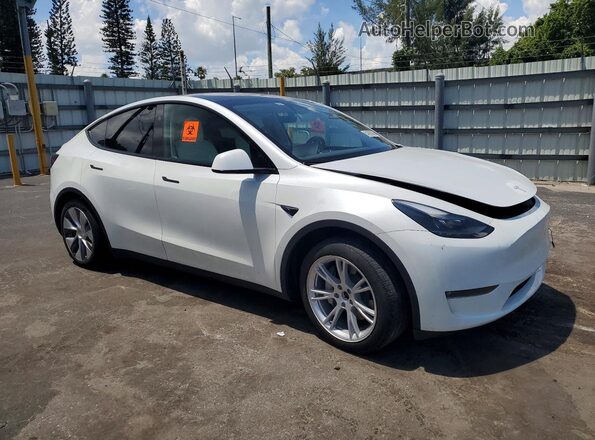 7SAYGDEE9PA211641 2023 TESLA MODEL White Front right