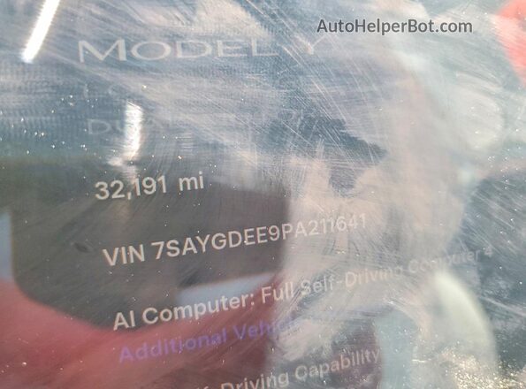 7SAYGDEE9PA211641 2023 TESLA MODEL White VIN sticker view