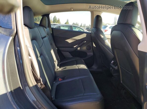 7SAYGDEEXPF609332 2023 TESLA MODEL Gray Rear interior view
