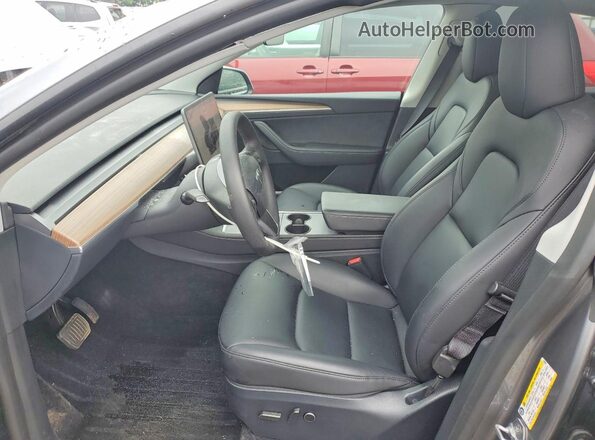 7SAYGDEEXSF262061 2025 TESLA MODEL Gray წინა სალონის ხედი