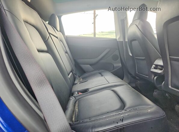 7SAYGDEF0NF345494 2022 TESLA MODEL Blue უკანა სალონის ხედი