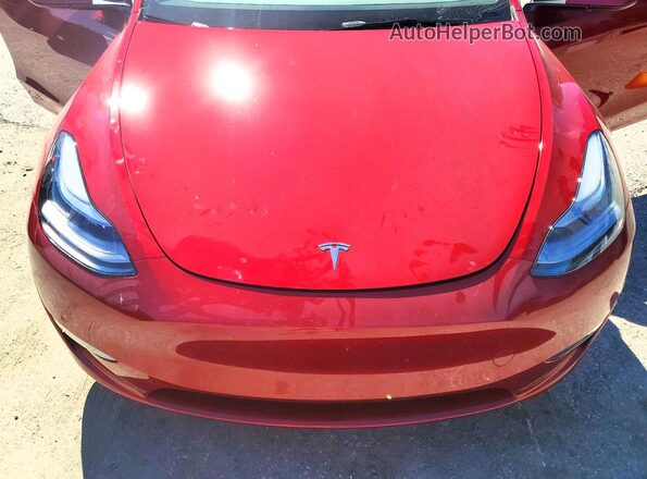 7SAYGDEF0SF259534 2025 TESLA MODEL Red უკანა სალონის ხედი