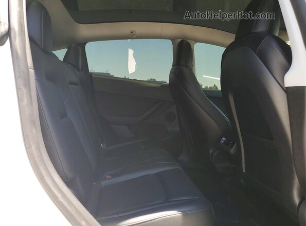 7SAYGDEF2NF336246 2022 TESLA MODEL White Rear interior view