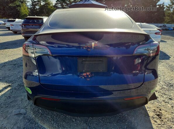 7SAYGDEF2NF381557 2022 TESLA MODEL Blue Rear view