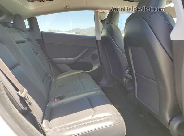 7SAYGDEF2PF713869 2023 TESLA MODEL White Rear interior view
