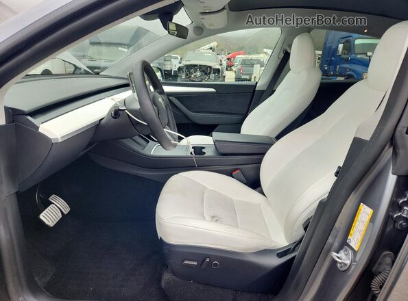 7SAYGDEF3RA296682 2024 TESLA MODEL Silver Vista interior delantera