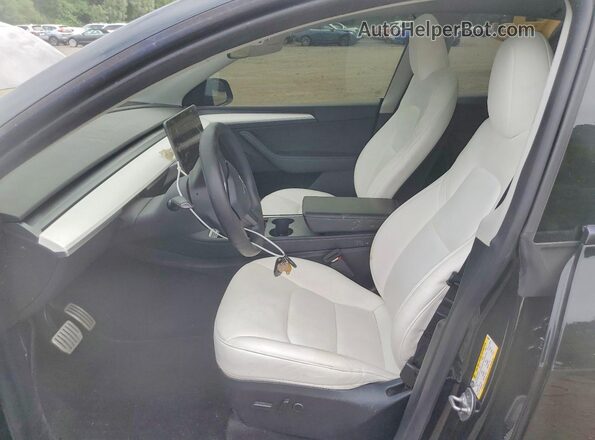 7SAYGDEF4RA269099 2024 TESLA MODEL Black წინა სალონის ხედი