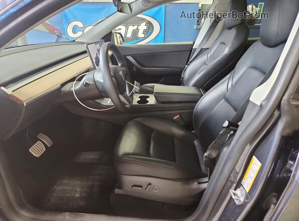 7SAYGDEF6NF377219 2022 TESLA MODEL Charcoal Front interior view