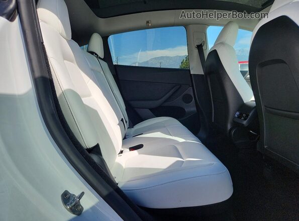 7SAYGDEF6RF113813 2024 TESLA MODEL White Vista de los asientos traseros