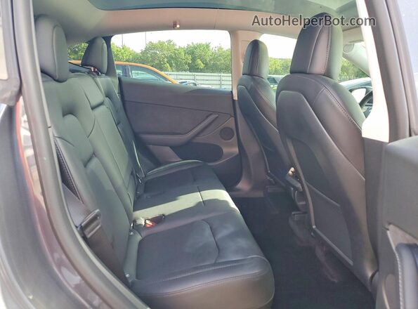 7SAYGDEF7NF536619 2022 TESLA MODEL Зеленый Вид задней части салона