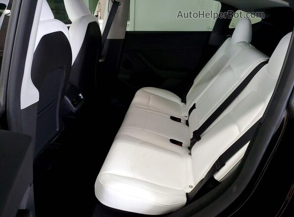 7SAYGDEF7RF087397 2024 TESLA MODEL Black Vista de los asientos traseros