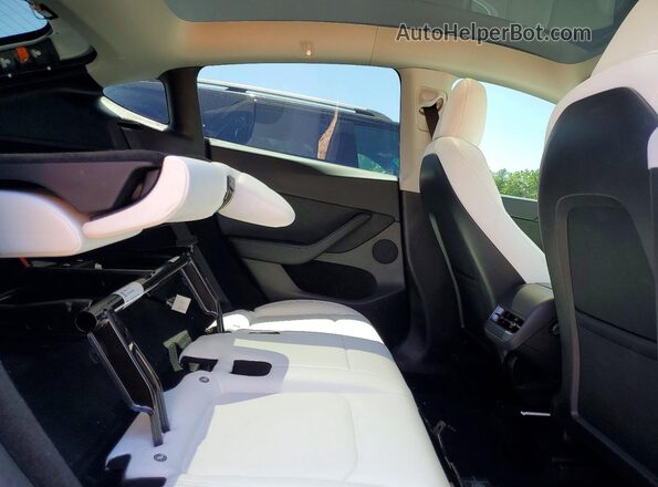 7SAYGDEF8PF777057 2023 TESLA MODEL White Vista de los asientos traseros