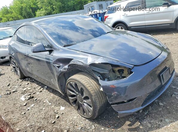 7SAYGDEF8RF027192 2024 TESLA MODEL Gray Front right