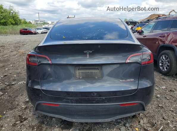 7SAYGDEF8RF027192 2024 TESLA MODEL Gray Rear view
