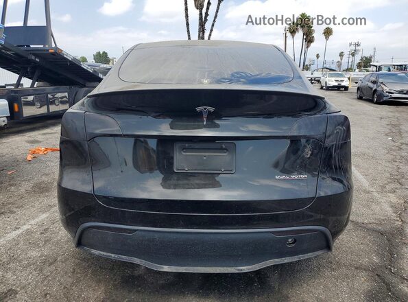 7SAYGDEF8RF077770 2024 TESLA MODEL Black Հետևի տեսք