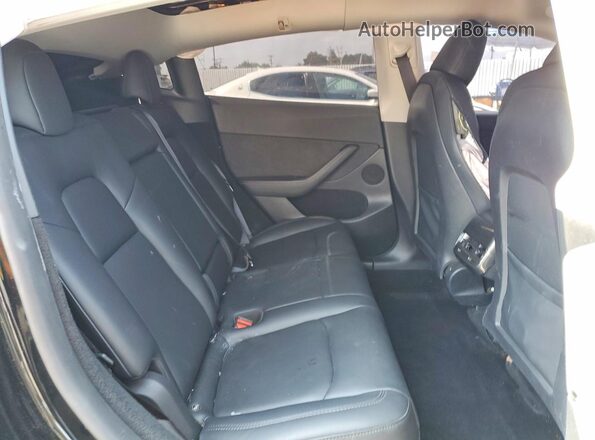 7SAYGDEF8RF077770 2024 TESLA MODEL Black Սալոնի հետևի տեսք