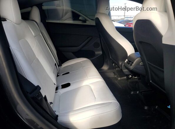 7SAYGDEF8SF307538 2025 TESLA MODEL Угольный Вид задних сидений