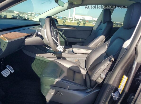 7SAYGDEF9SF263887 2025 TESLA MODEL Black წინა სალონის ხედი