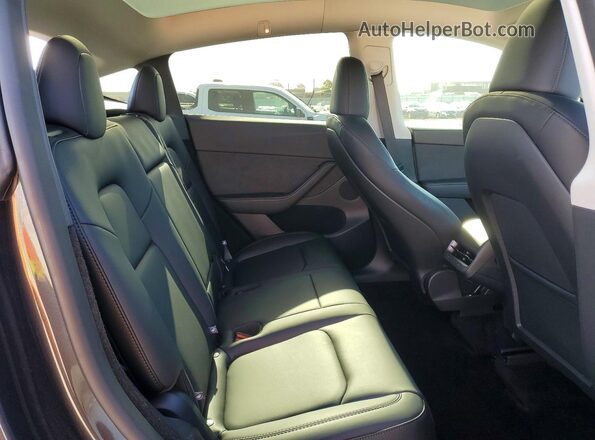 7SAYGDEF9SF263887 2025 TESLA MODEL Black უკანა სავარძლების ხედი