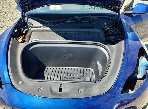 7SAYGDEFXNF561384 2022 TESLA MODEL Blue Widok wnętrza z tyłu