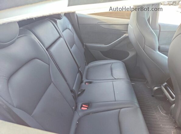 7SAYGDET9TA672492 2026 TESLA MODEL Red Вид задніх сидінь