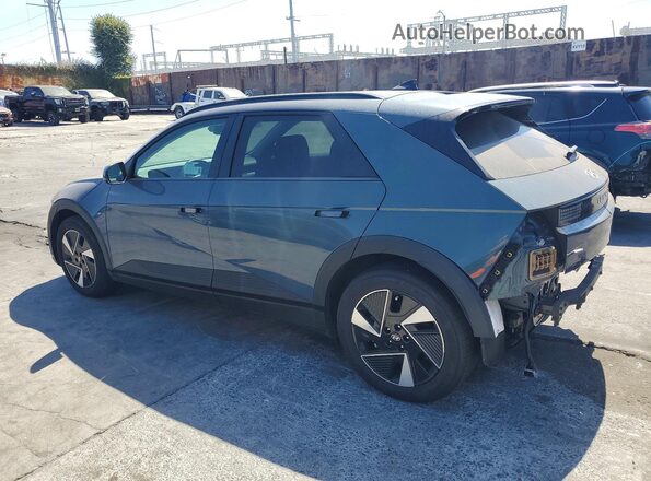 7YAKN4DA2SY011406 2025 HYUNDAI IONIQ Gray Rear left