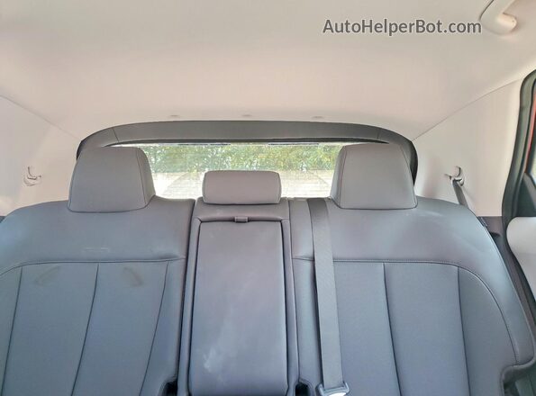 7YAKNDDC6TY045237 2026 HYUNDAI IONIQ Red Vista de los asientos traseros