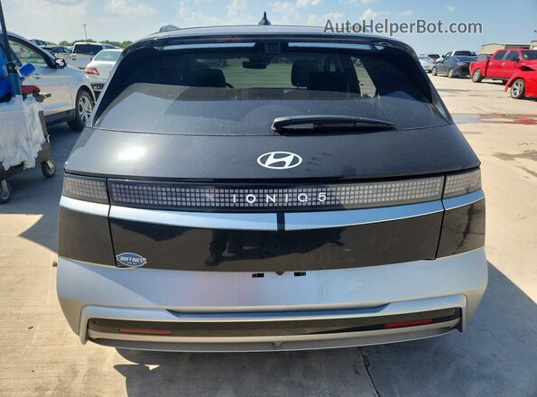 7YAKR4DA7TY052863 2026 HYUNDAI IONIQ Charcoal Widok z tyłu