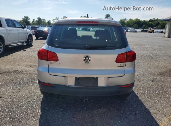 WVGBV7AX4GW555132 2016 VOLKSWAGEN TIGUAN Серебряный Вид салона спереди