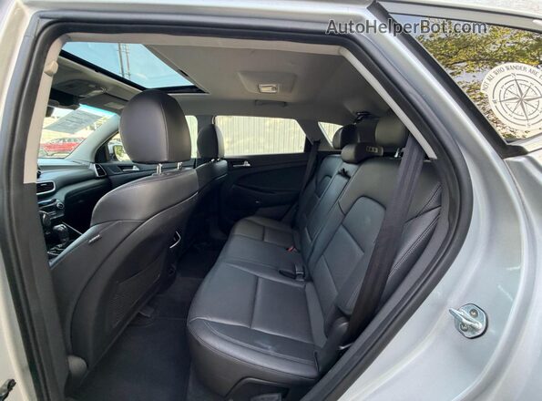 KM8J33AL4KU855359 2019 HYUNDAI TUCSON Серебряный Вид салона спереди