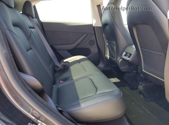 7SAYGDEE1RA229893 2024 TESLA MODEL Charcoal უკანა სალონის ხედი
