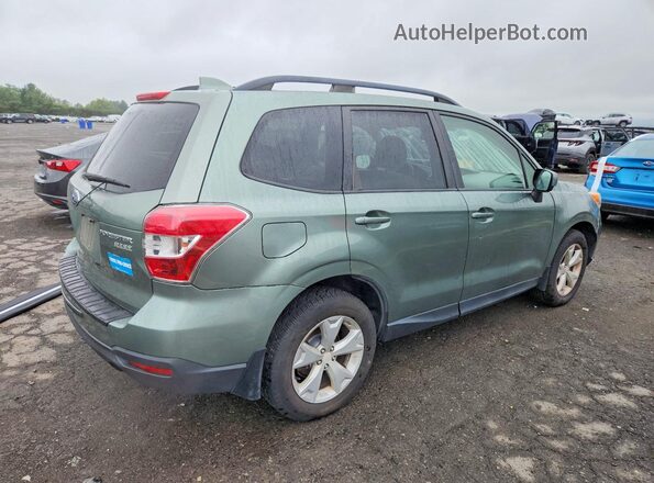 JF2SJADC2GH407007 2016 SUBARU FORESTER Green Front right