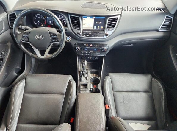 KM8J33A20JU737671 2018 HYUNDAI TUCSON Silver ხელსაწყოთა პანელის ხედი